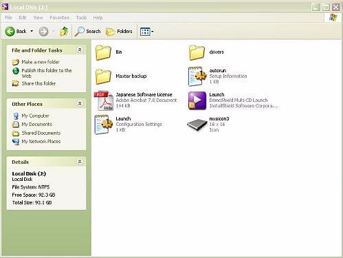 Once installed, the Maxtor's files may be accessed from the desktop. The user can simply drag & drop the files to copy…