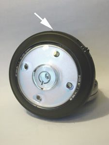puck_led_light_figure1 An auto-sensing LED "puck" light (arrow points to optical sensor)