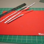Adhesive applied, and trimmed to size