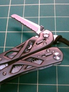 Close up of thumb tab, release, and tool fasteners