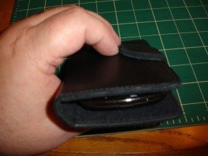 Wallet in use, end view- note the angle of the magnetic tab