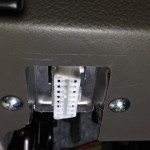 The OBD port under the dash of my car.
