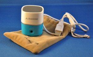 The Avantree speaker is a compact package with a USB charging cable and a plush carry bag.