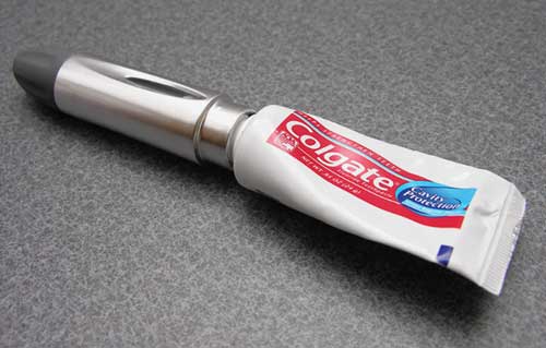 travel toothbrush with toothpaste in handle