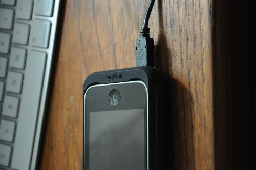 iPhone in Mophie with charging cable attached