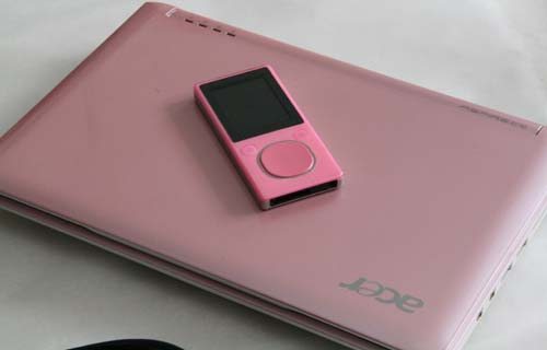 Acer Aspire One in Pearl Pink with Zune.  Zune sold separately.