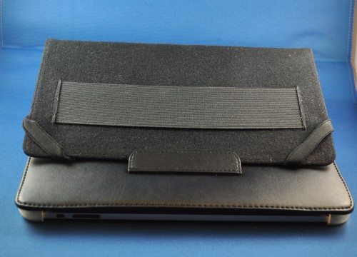 Corner straps and the hand strap shown with front cover tucked into back tab.