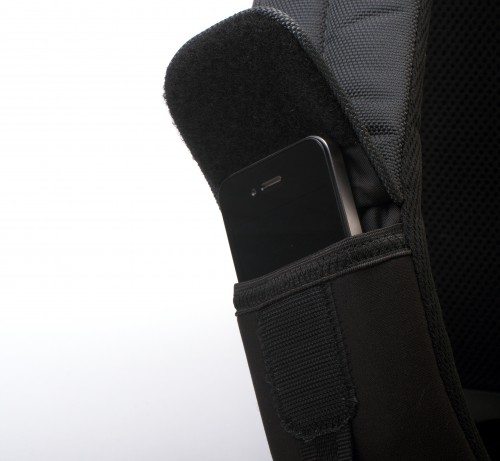 The strap pocket will just barely hold a naked iPhone 4/4s