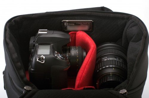 The Python holds a lot of gear. This is to top pocket, holding a full-sized dSLR and two lenses.
