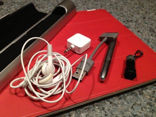 It all fits: Apple Earbuds, a Fisher Space Pen, a Square dongle, an Encase USB-30-pin cable, and a Streamlight Nanolight.