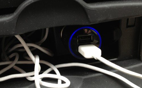 The Belkin 2-port adapter under power, showing the blue LED.