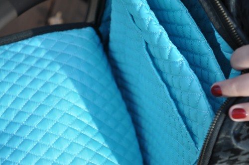 This quilted turquoise fabric is in all inner surfaces.