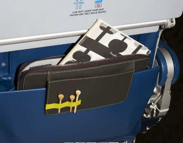 For in-flight convenience, Walter + Ray TAB bags fit in the seatback in  front of you - The Gadgeteer