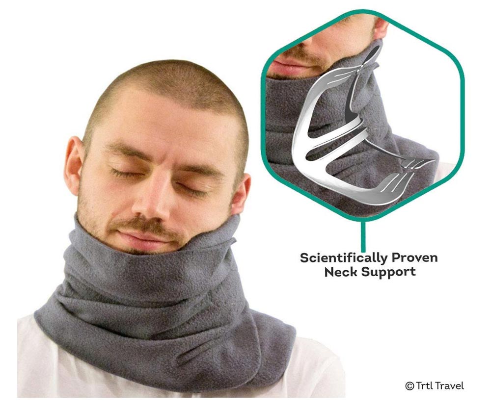 comfy travel pillow lies with a turtle 