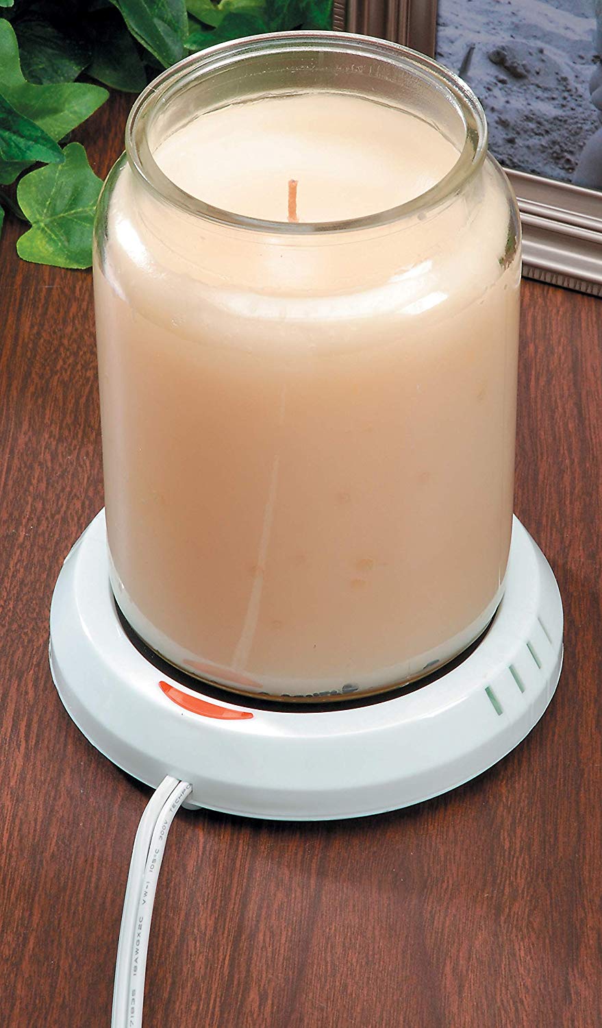 Love the candle, hate the flame? Try a Darice candle warmer. The
