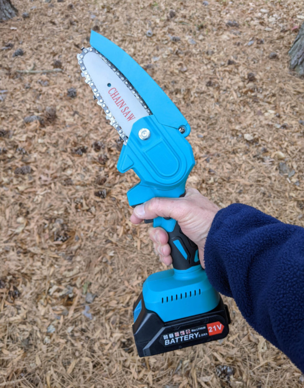 Denqir Mini Chainsaw Review: Testing It Out On Branches, Trees, And Lumber  