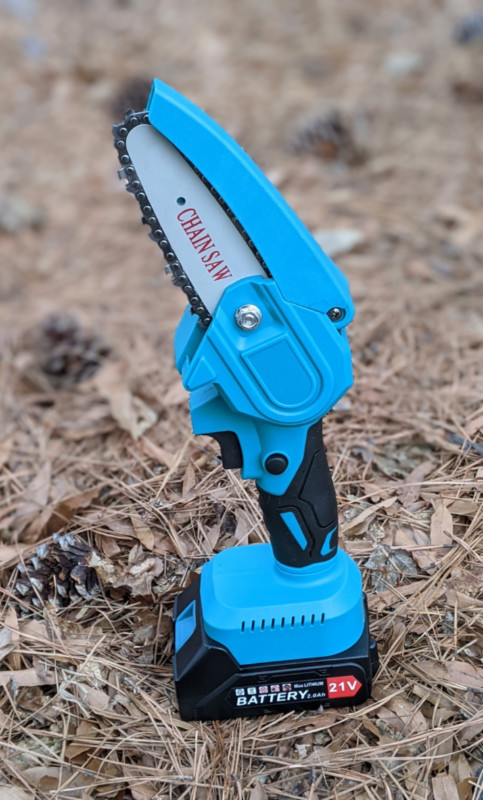 Denqir Mini Chainsaw Review: Testing It Out On Branches, Trees, And Lumber  