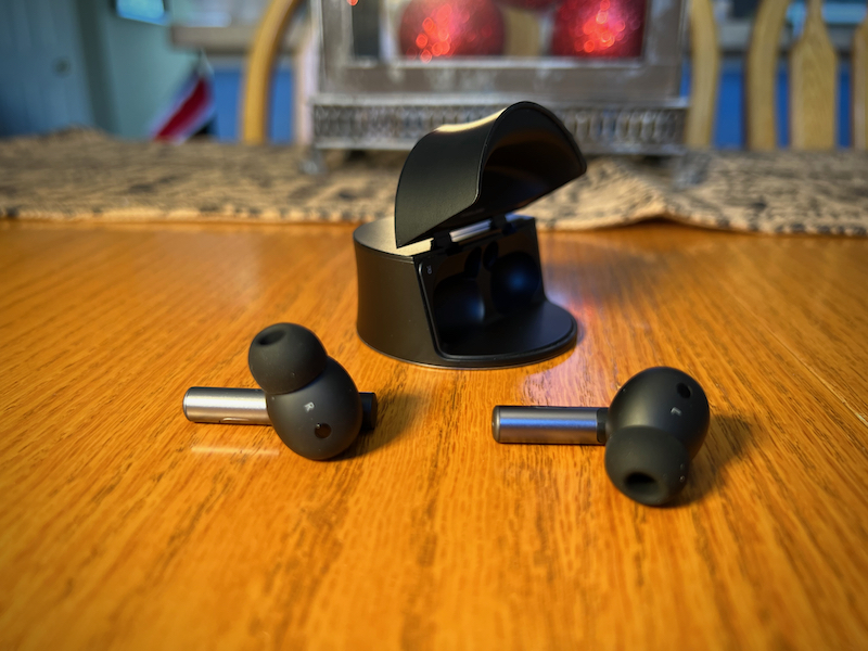 Oddict TWIG PRO earbuds with charging case open
