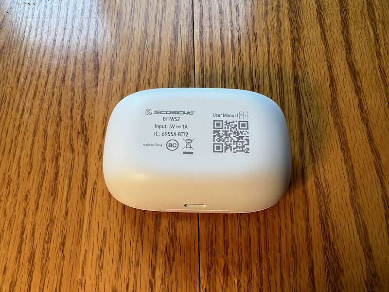 Bottom of the Scosche ThudBuds case with a helpful QR code that links to the manual