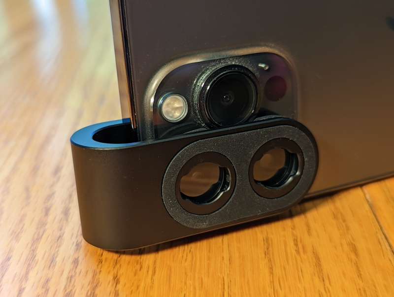 Included lens clip attached on my iPhone 13 Pro Max (rear view)