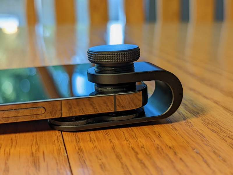 Included lens clip attached on my iPhone 13 Pro Max (side view)