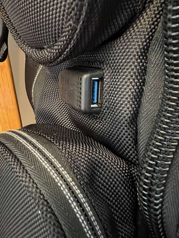 External USB port molded into the backpack