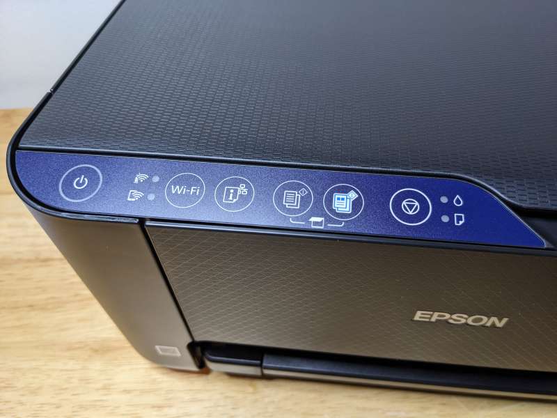 Help! My brand new Epson ET2400 printing faint and lines with