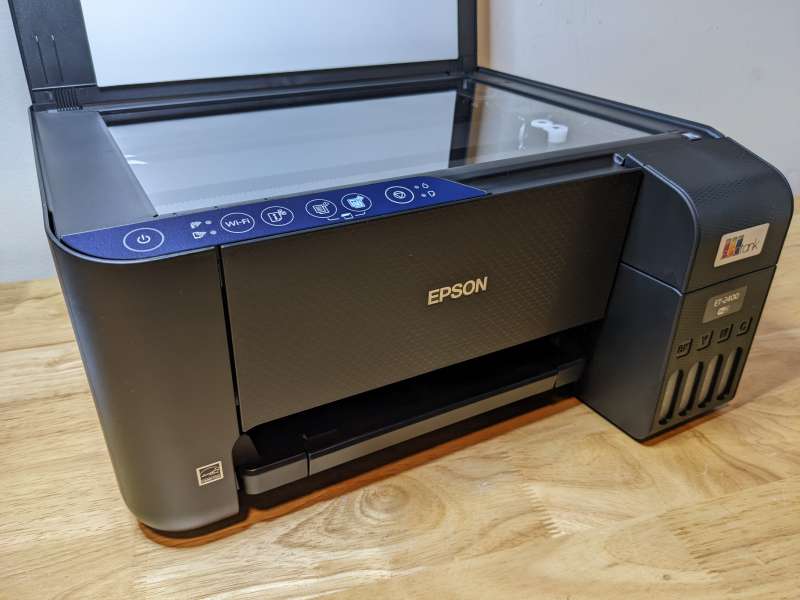 Help! My brand new Epson ET2400 printing faint and lines with