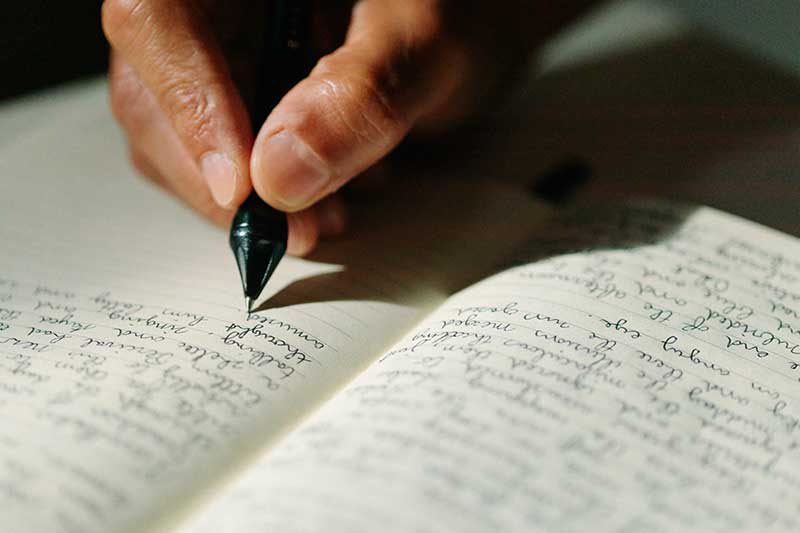 Paper And Pen Writing