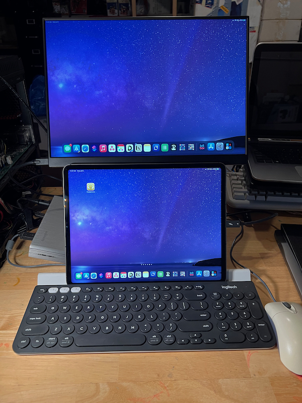 Full desktop mode with Thunderbolt dock, external bluetooth keyboard, and a wired mouse
