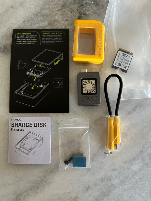 Sharge Disk: The keychain-sized external SSD enclosure going places on  Kickstarter -  News