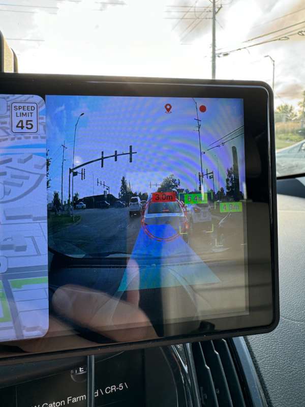 Aoocci V30(S) Smart Portable Apple CarPlay Display showing ADAS Warning System overlays