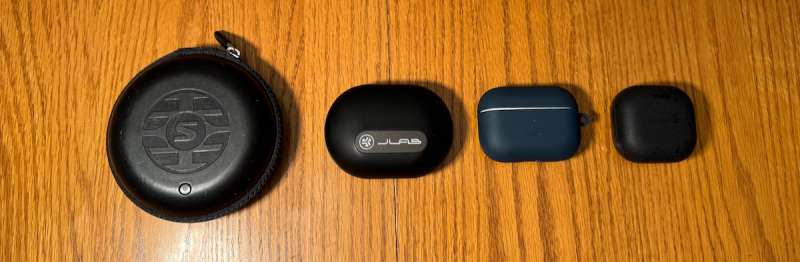 From left to right: Shure AONIC 215, JLab Epic Sport ANC 3, Apple AirPods Pro 2 (in a case), Samsung Galaxy Buds2 Pro