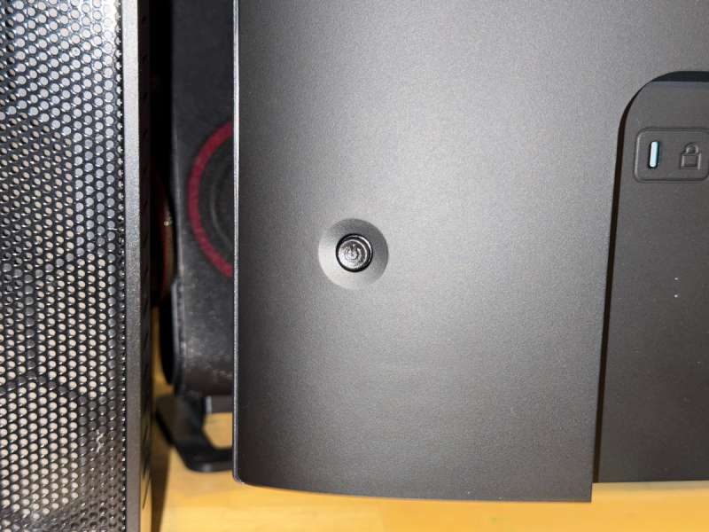 There's a small joystick/button on the back for hands-on control of the monitor