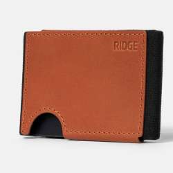 The OG of minimalist wallets has gone from metal to leather