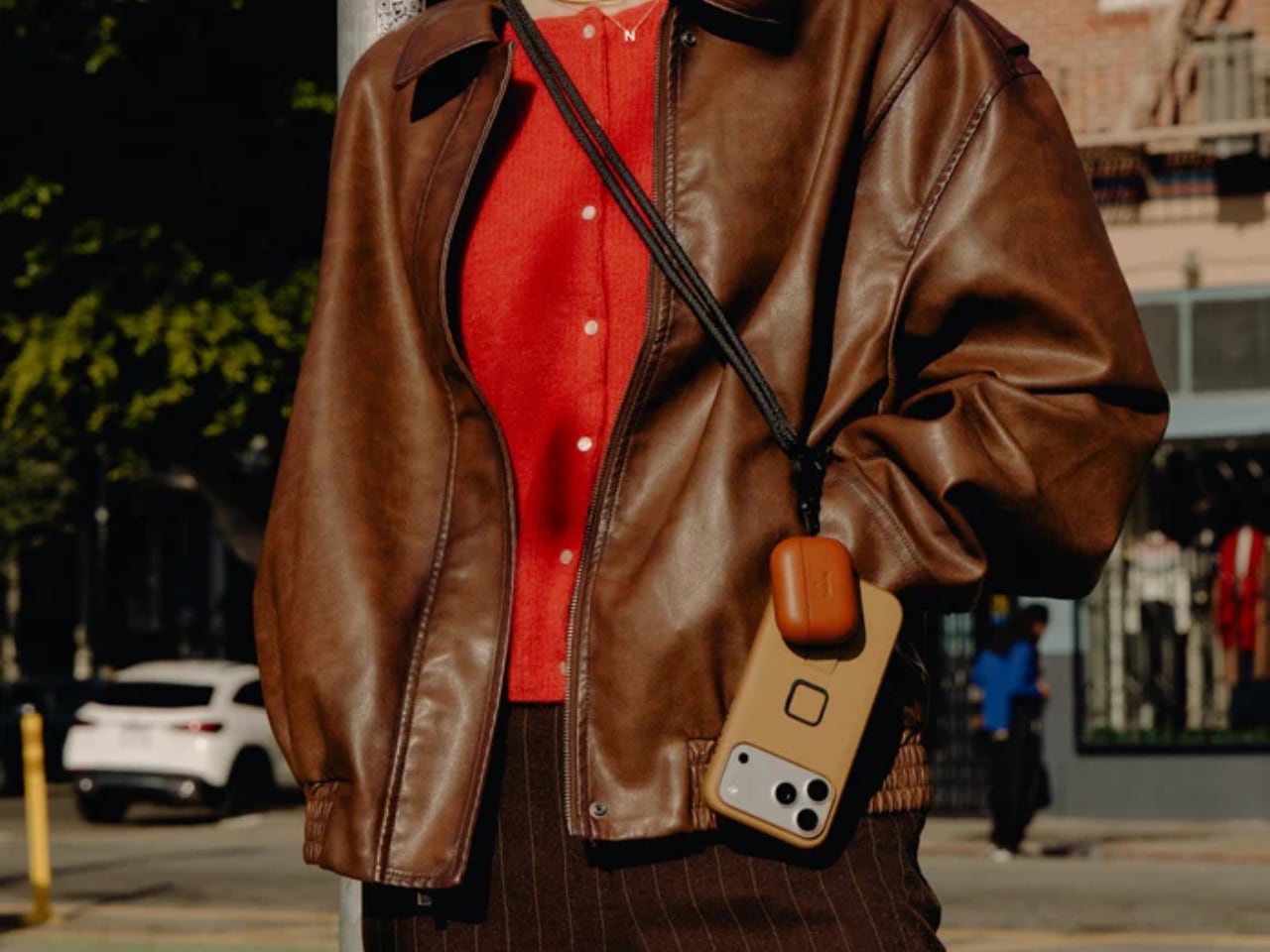 Peak Design Mobile Cuff, Crossbody Strap, and Crossbody Multi-Strap laid out with Micro Anchor connectors visible, showing CNC machined aluminum hardware and custom woven cords