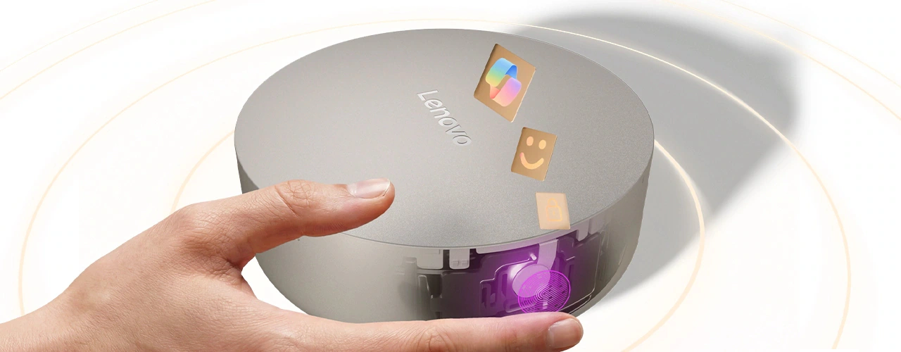 Front view of Lenovo Yoga Mini i Gen 11 PC showing its compact circular design and aluminum finish.