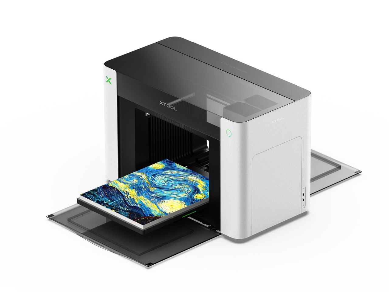 Angled studio view of the xTool O1 Omni printer with a printed sample in front
