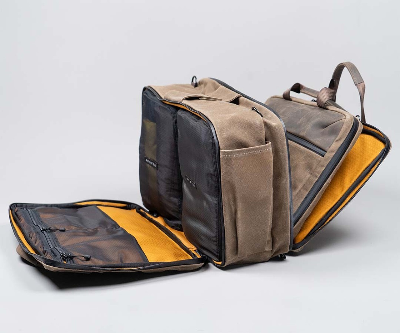 The Carryall opened with the removable Slim Brief and packing cubes