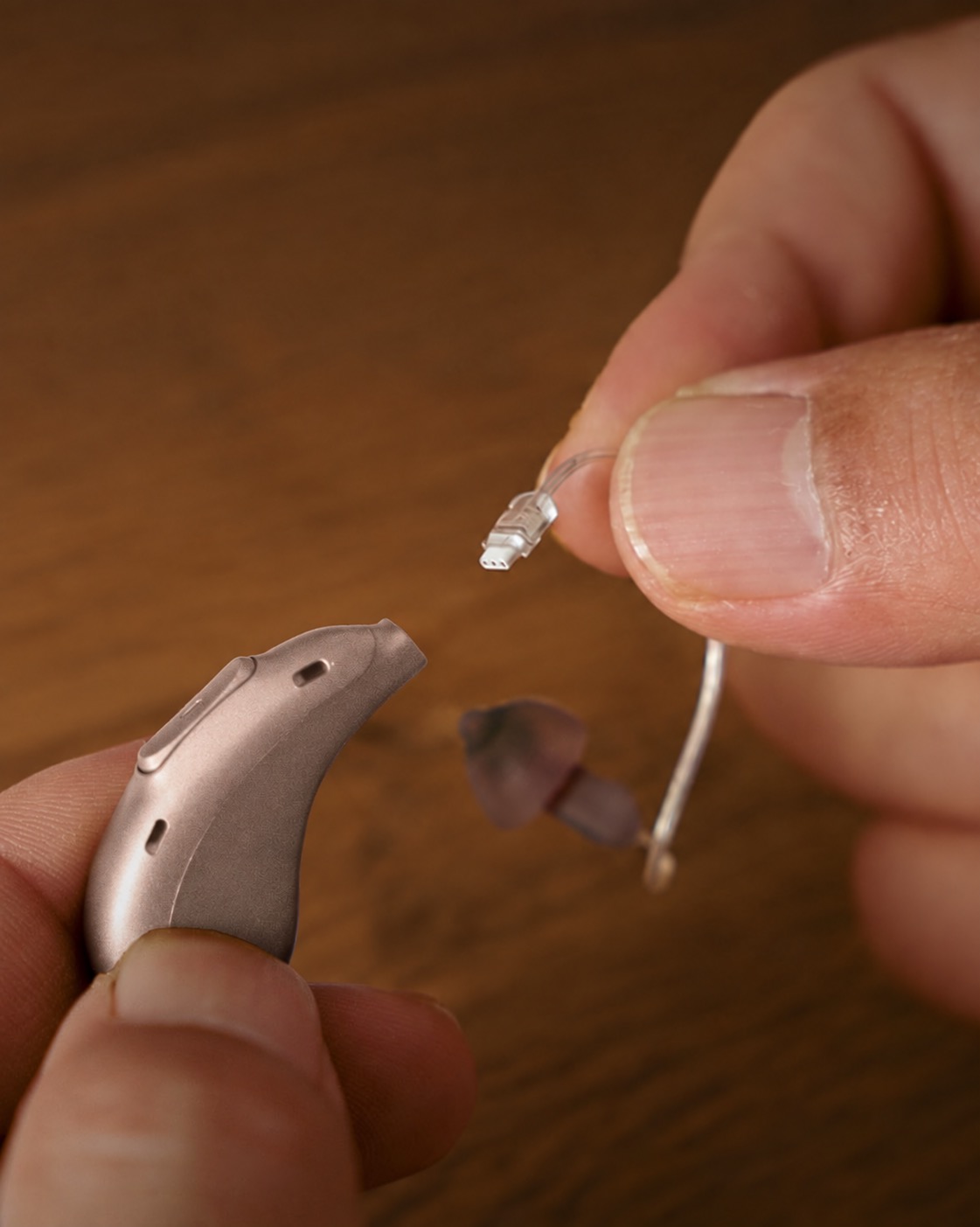 Detachable receiver connector beside the Beyond 2 Pro hearing aid body.