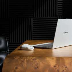 Lenovo Googlebook 15 and AI Mouse on a wooden studio desk