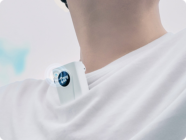 Pongbot player-position sensor clipped to a tennis player’s shirt.
