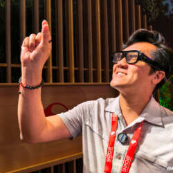 Vincent wearing Snap SPECS AR glasses and gesturing during a hands-on demo
