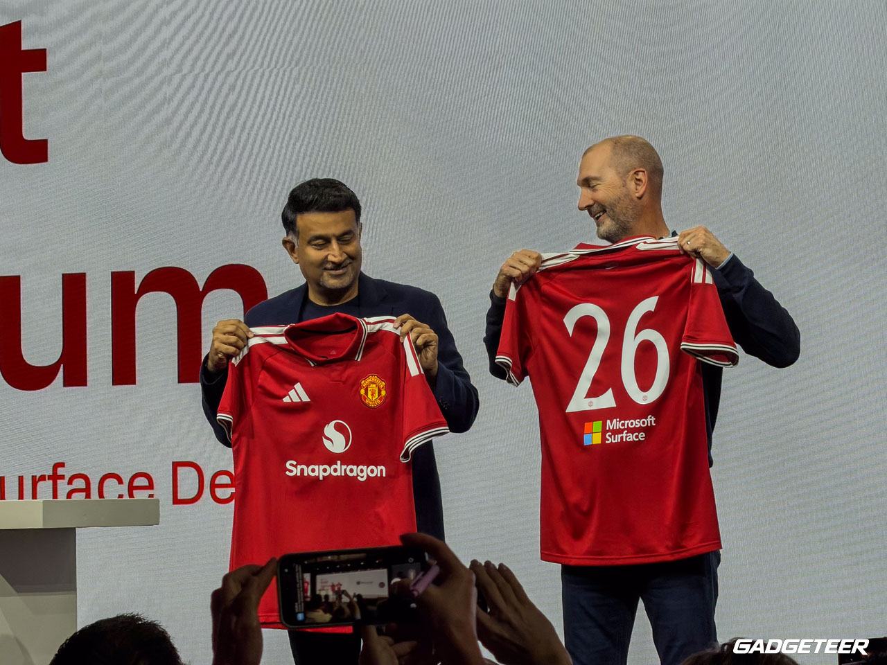 Manchester United jerseys showing Snapdragon and Surface branding