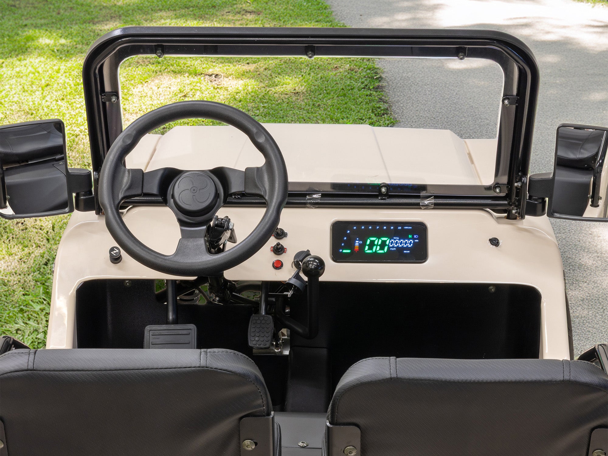 The Mini Truck's steering wheel, digital instrument display and gear lever