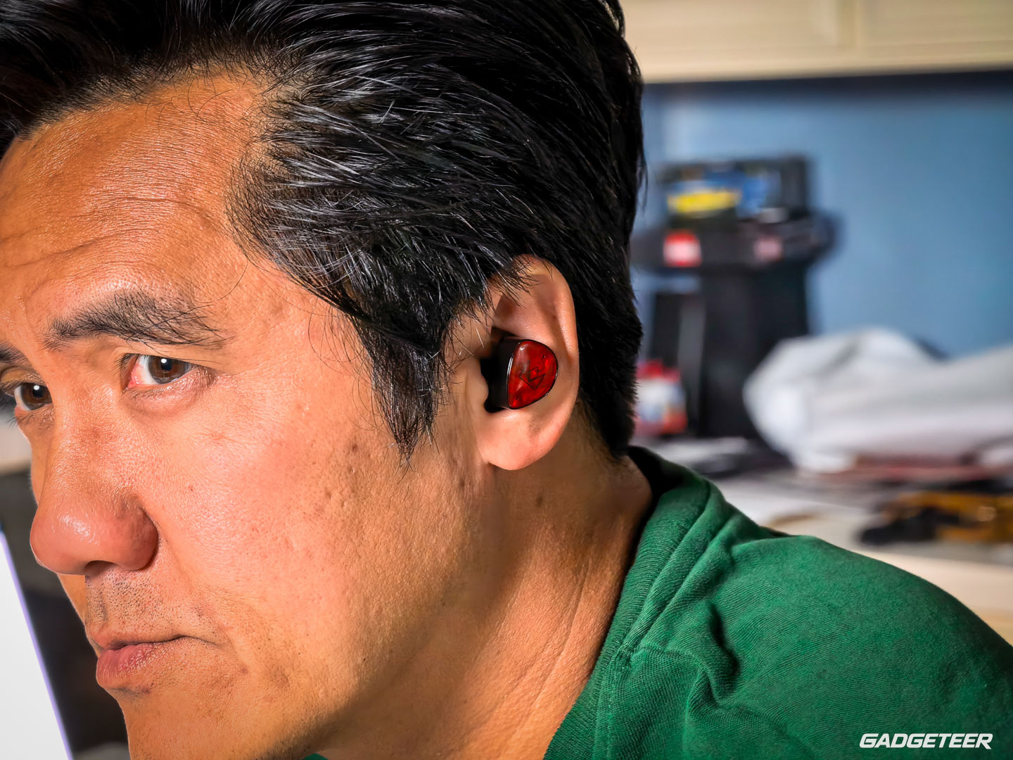 Vincent wearing a Noble FoKus Amadeus earbud, showing how the shell sits in his ear