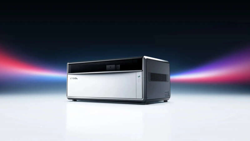 xTool X1 enclosed laser machine on a workbench