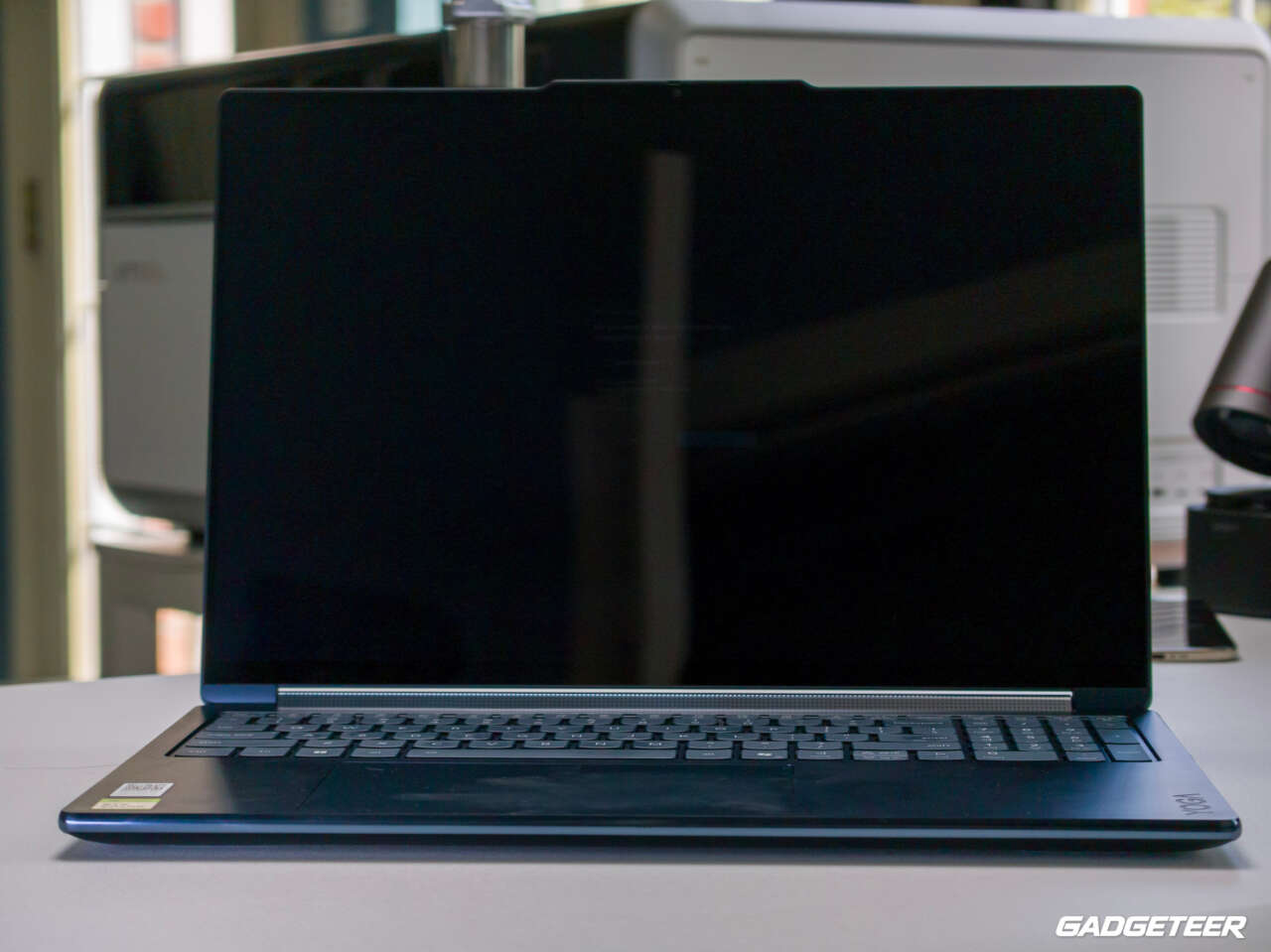Lenovo Yoga 9n open in Cosmic Blue, viewed from the front