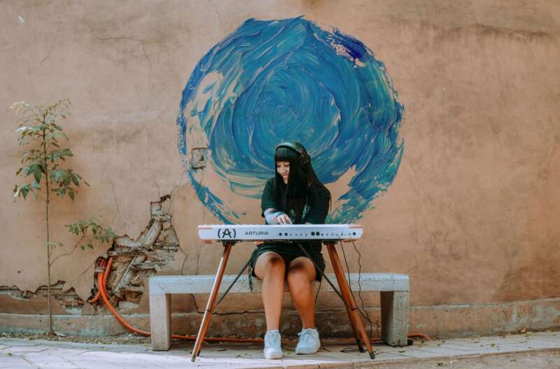 Arturia AstroLab keyboard being played outdoors