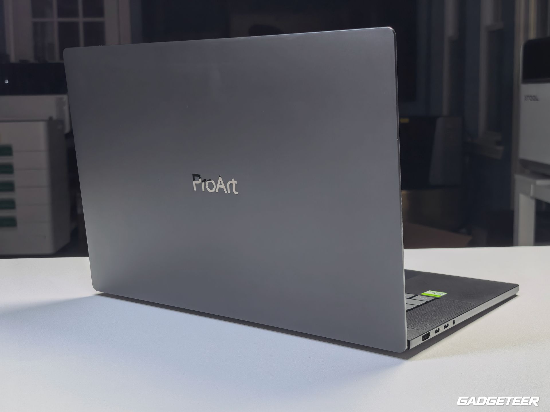 Rear view of the ASUS ProArt P16 showing its ProArt lid and right-side ports.